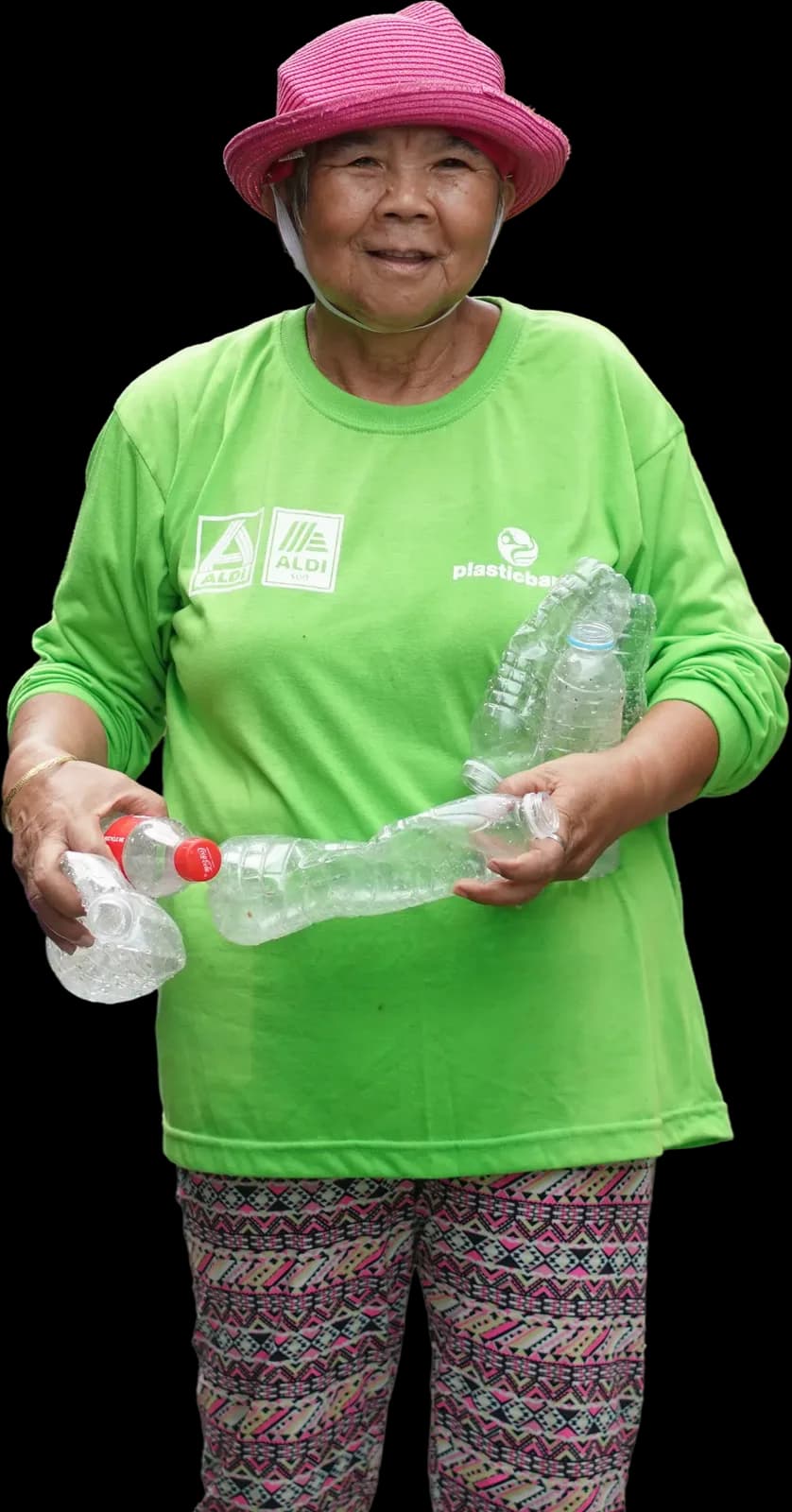 Elizabeth, a Plastic Bank collection member in Baseco, Manila, holding gathered plastic bottles